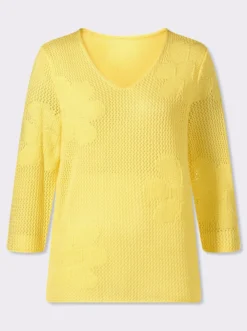 Ajourpullover mit eingestrickten Blüten