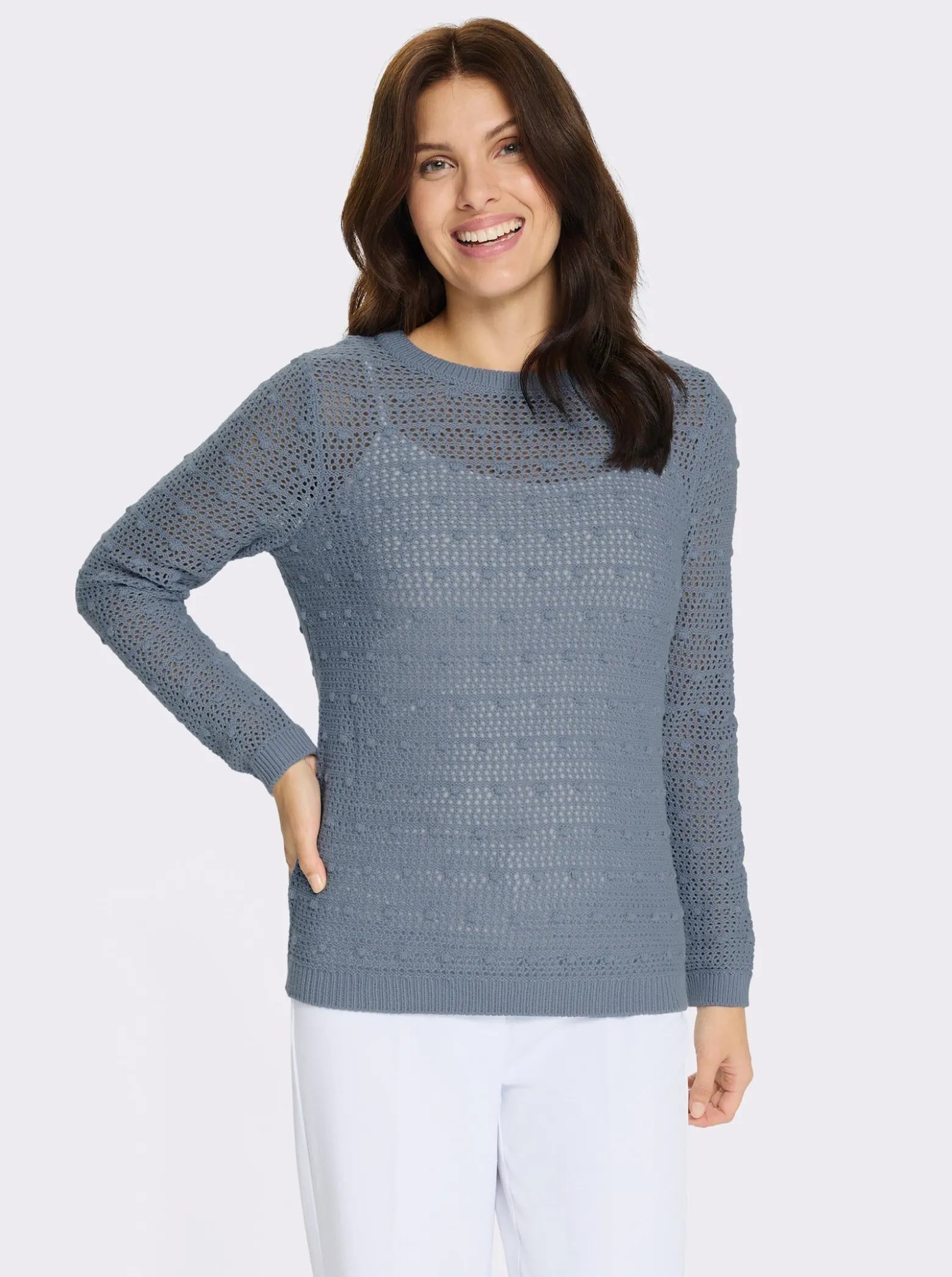 Ajourpullover mit eingestrickten Punkten