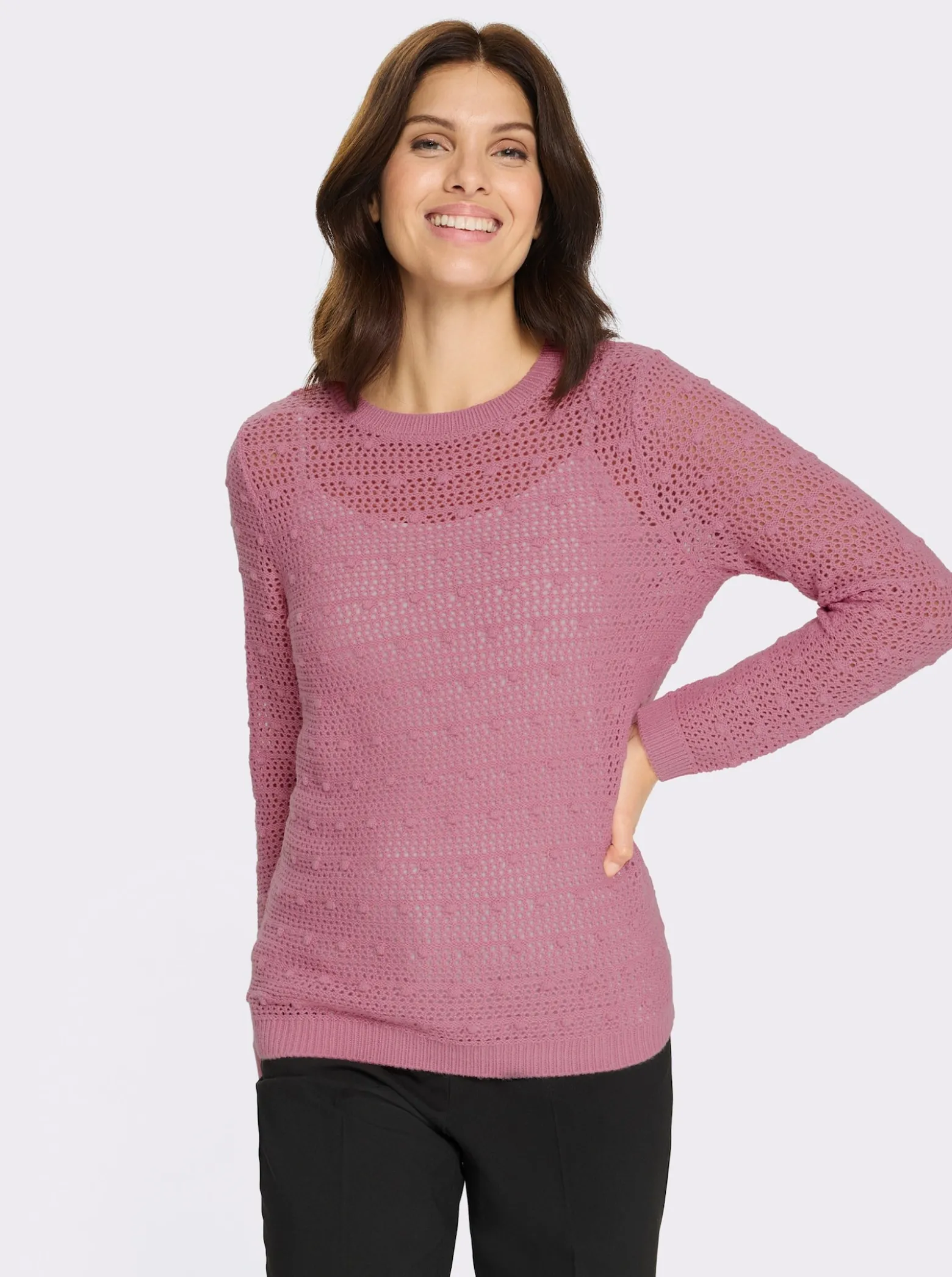 Ajourpullover mit eingestrickten Punkten