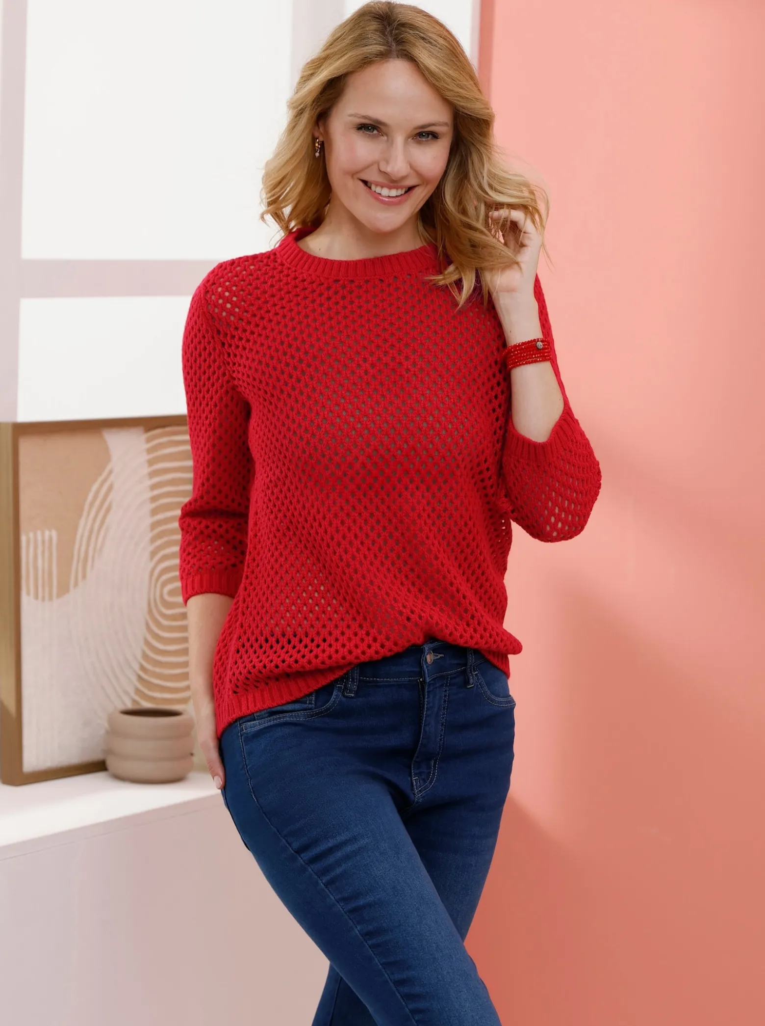 Ajourpullover mit gerippten Bündchen