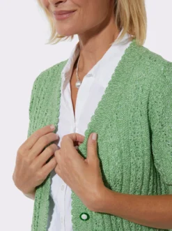 Ajourstrickjacke mit Taschen, aufgesetzt