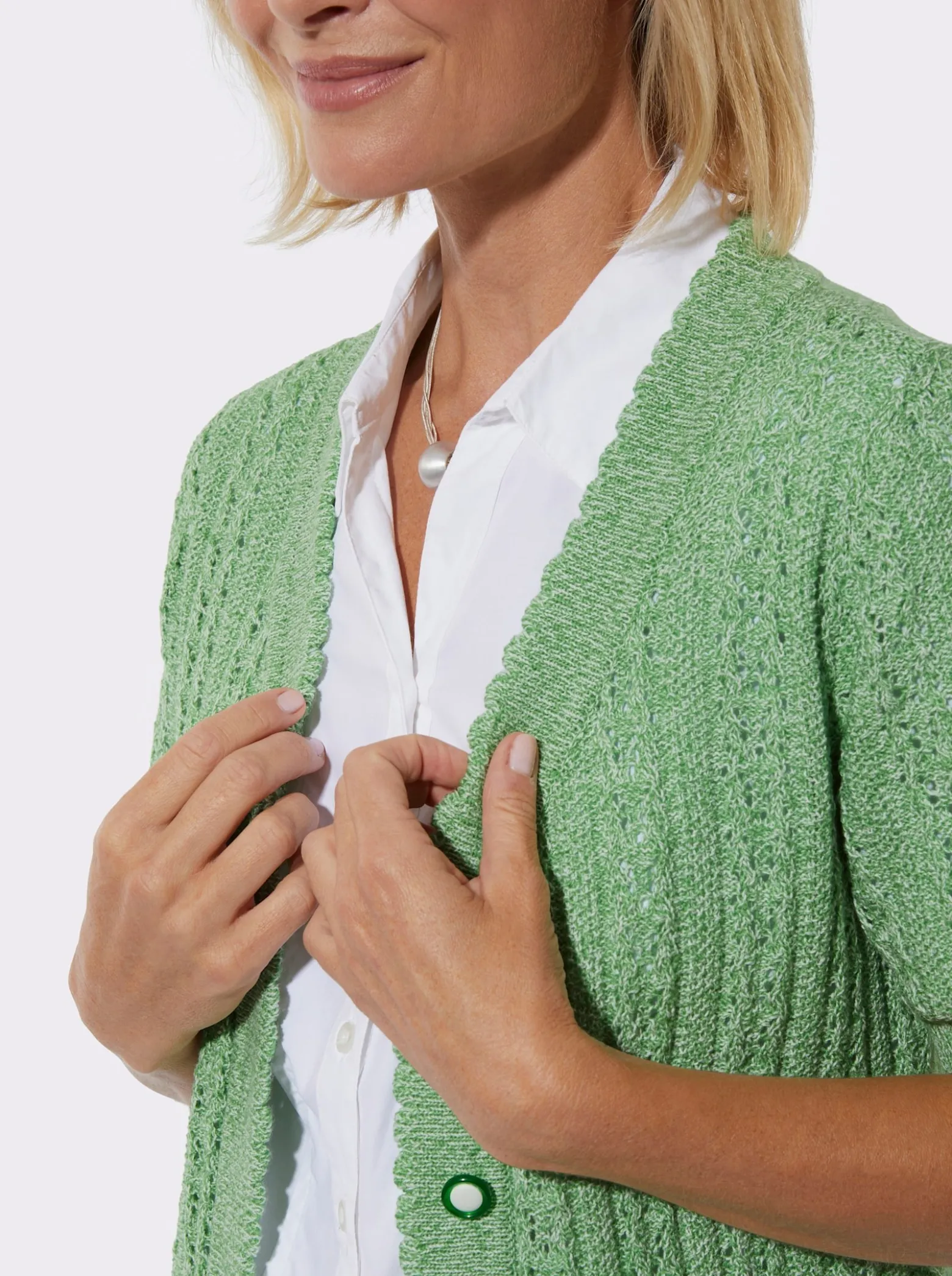Ajourstrickjacke mit Taschen, aufgesetzt