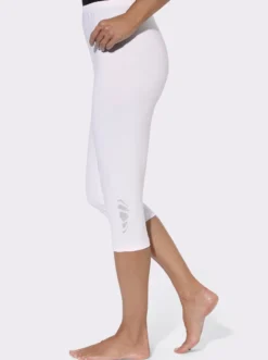 Caprileggings mit Glitzerdruck am Saum