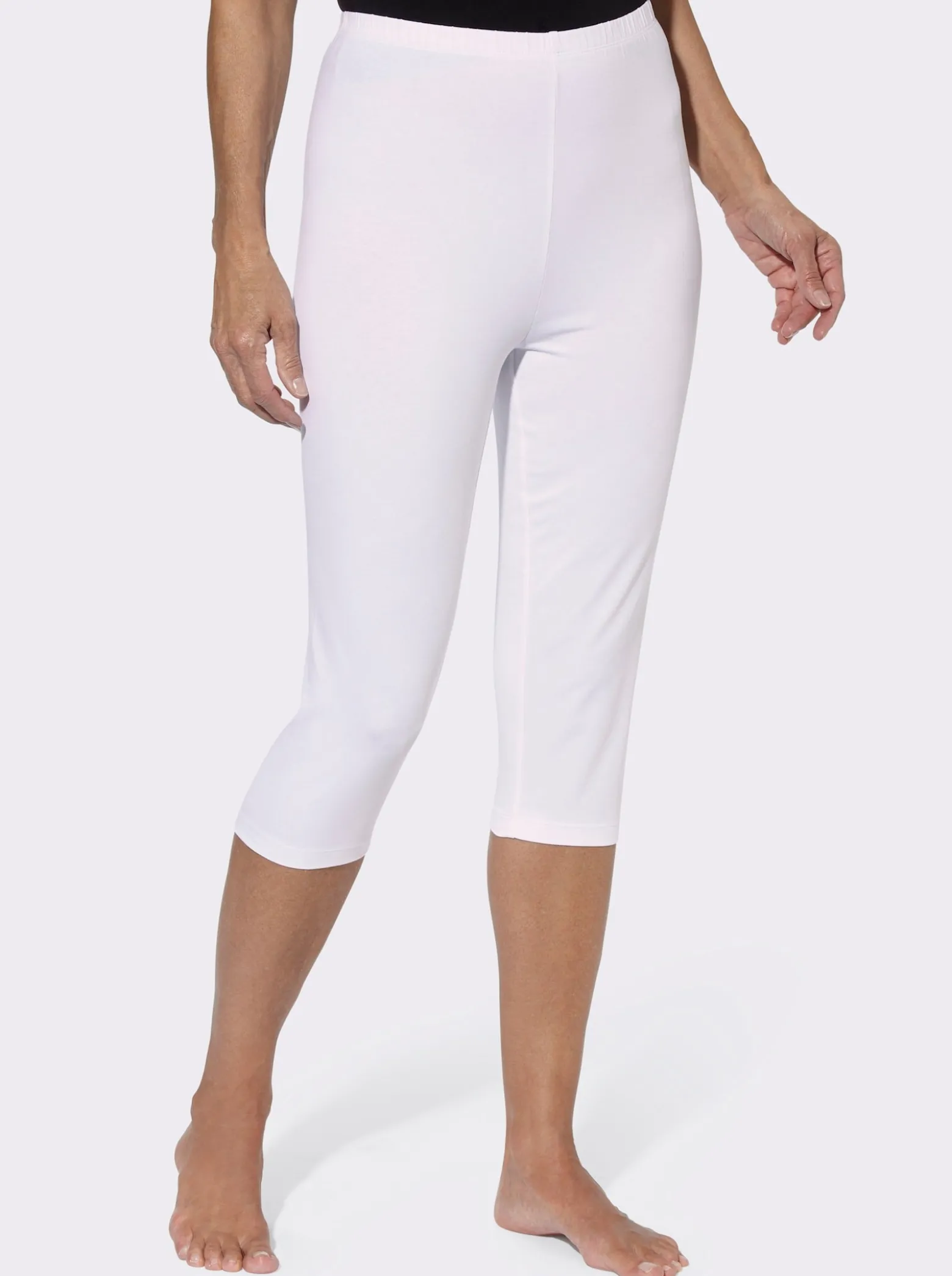 Caprileggings mit Glitzerdruck am Saum