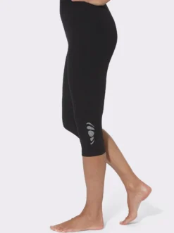 Caprileggings mit Glitzerdruck am Saum