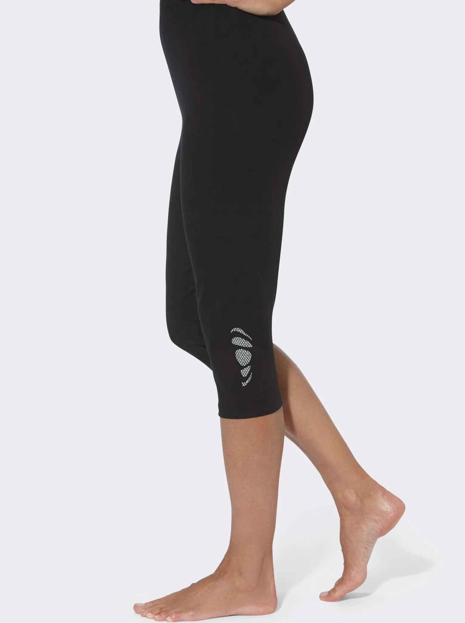 Caprileggings mit Glitzerdruck am Saum