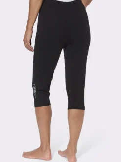 Caprileggings mit Glitzerdruck am Saum