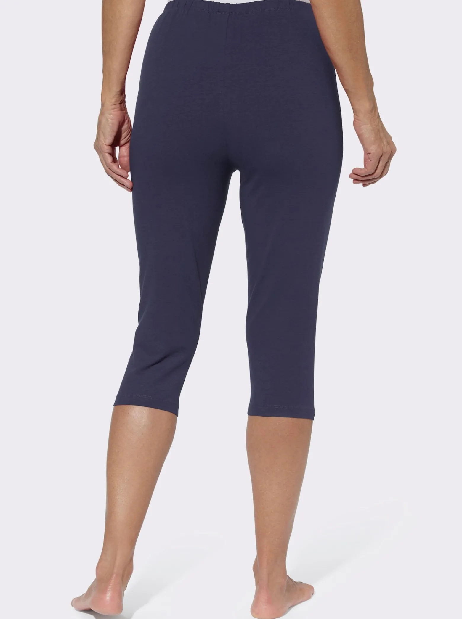 Caprileggings mit Glitzerdruck am Saum
