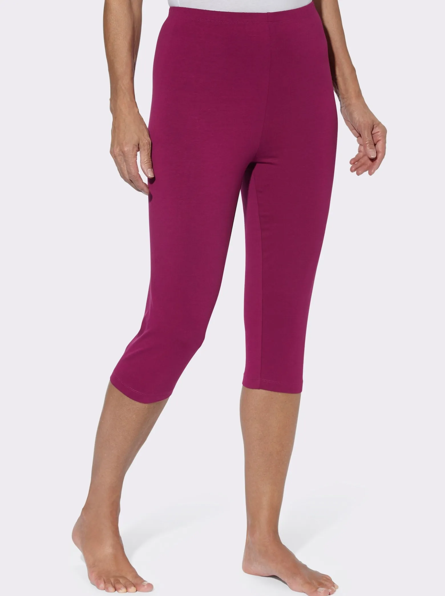 Caprileggings mit Glitzerdruck am Saum