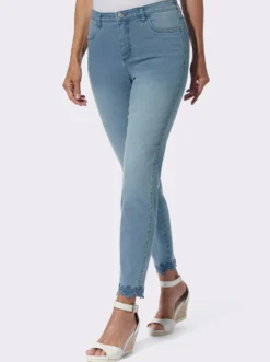 Jeans mit besticktem Wellensaum
