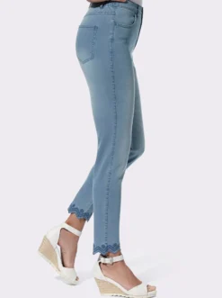 Jeans mit besticktem Wellensaum