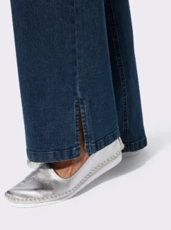 Jeans mit weitem Bein und Schlitz