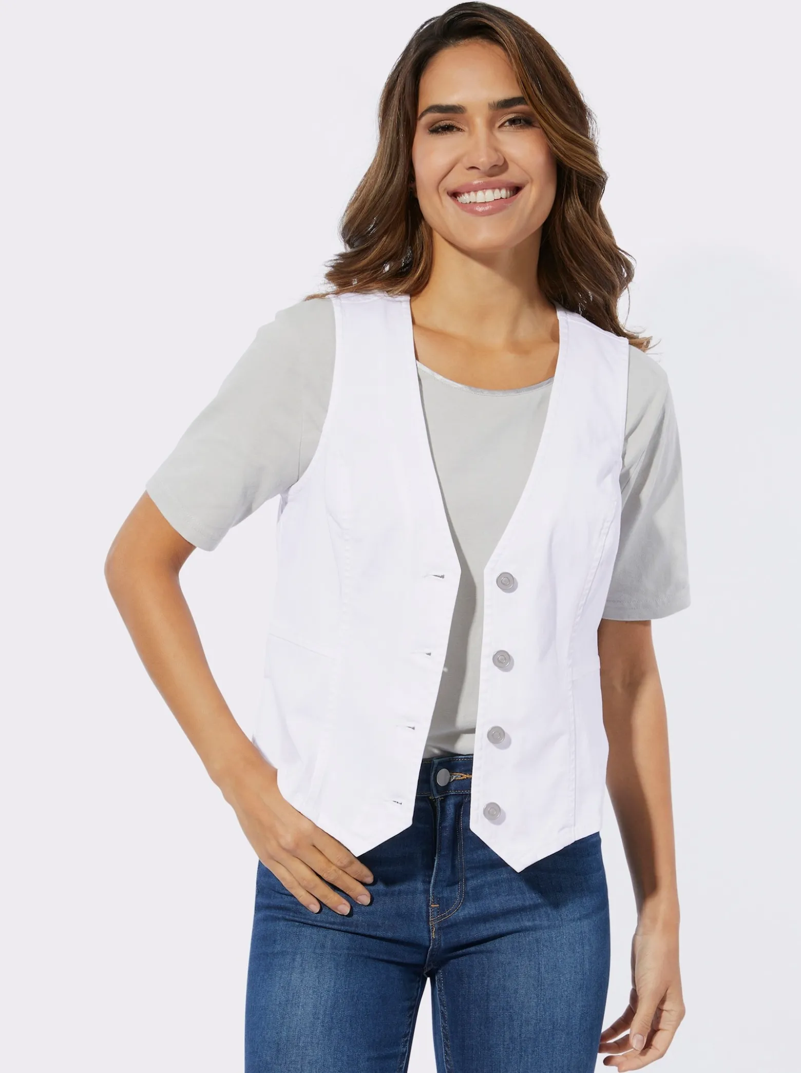 Jeansweste mit spitz zulaufendem Saum vorne