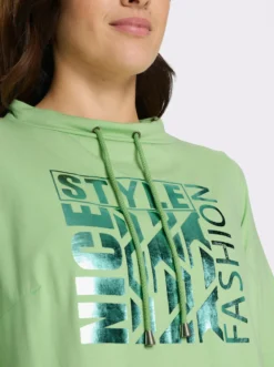 Jerseykleid mit abgerundeten Seitenschlitzen
