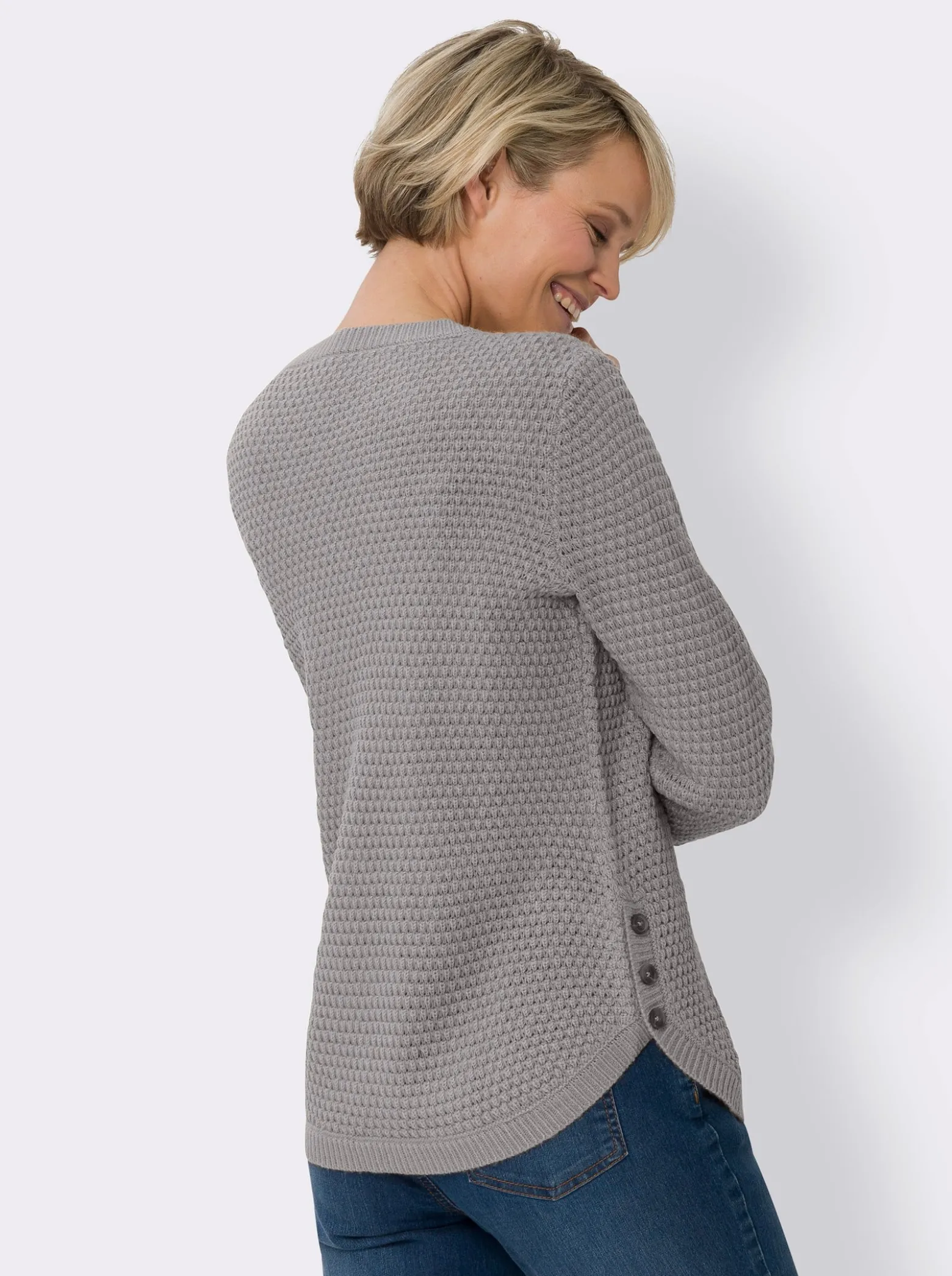 Langarm-Pullover mit Zierknöpfen am Saum