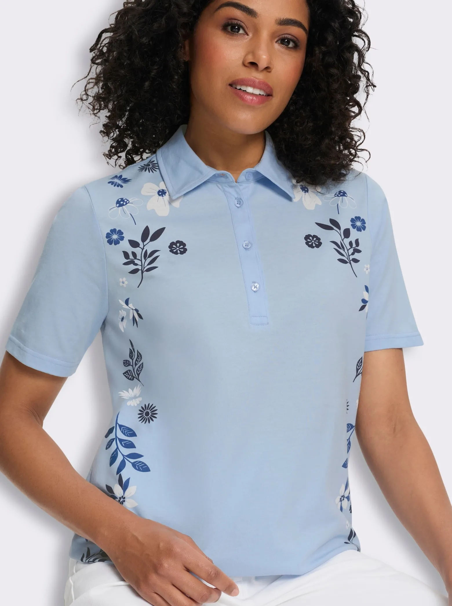 Poloshirt mit Blüten-Blätter-Druck vorne