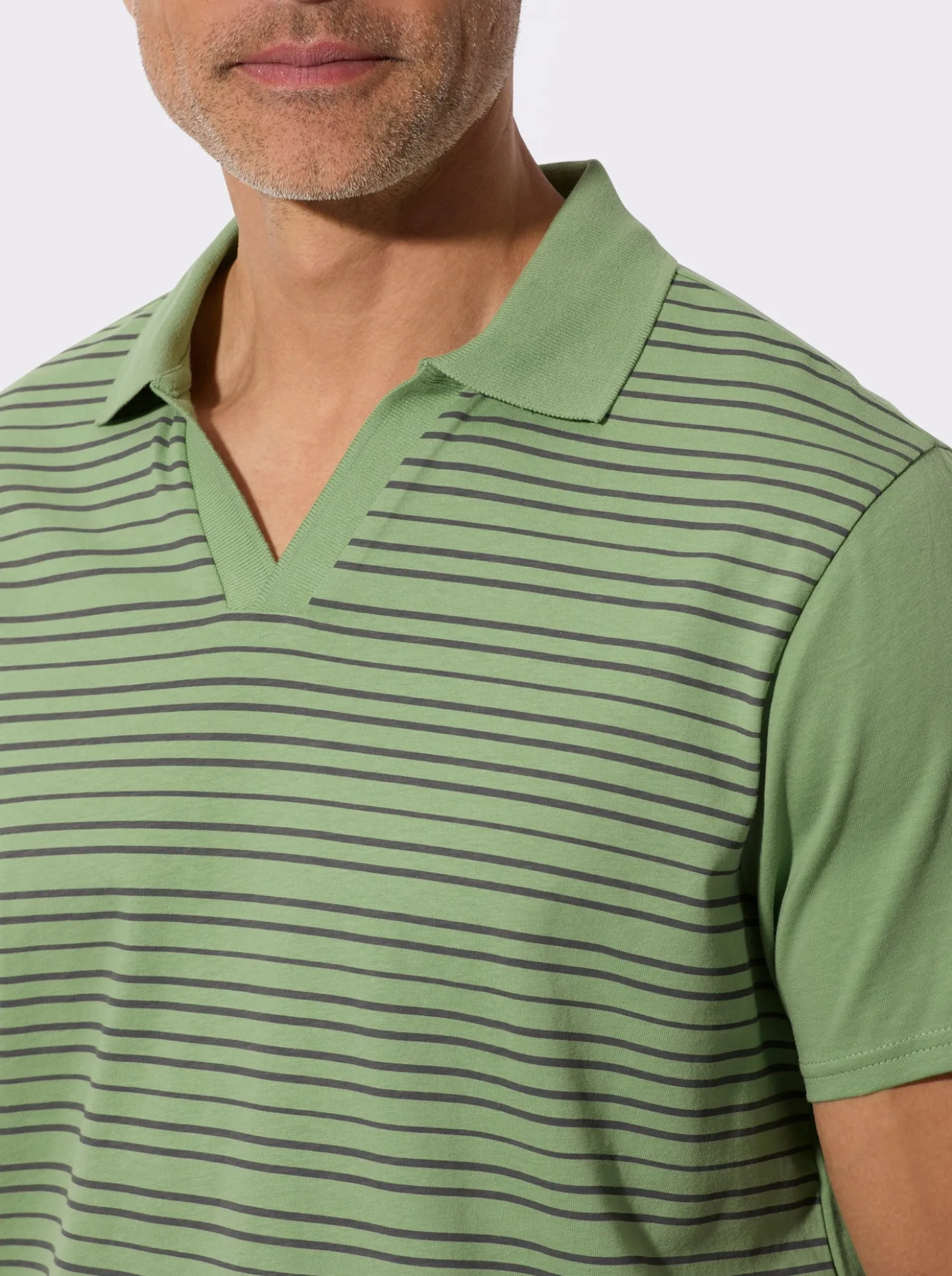 Poloshirt mit elastischem Saumabschluss