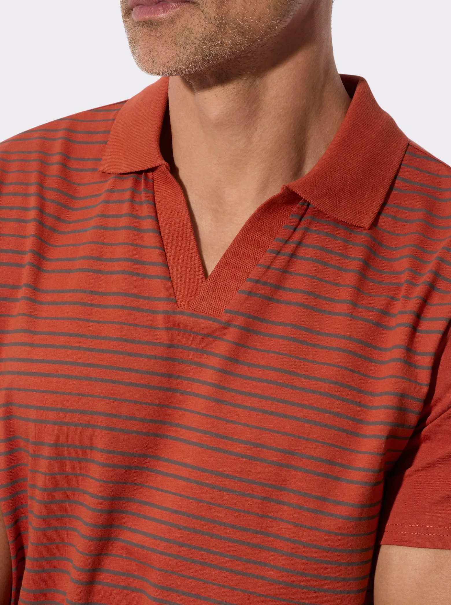 Poloshirt mit elastischem Saumabschluss