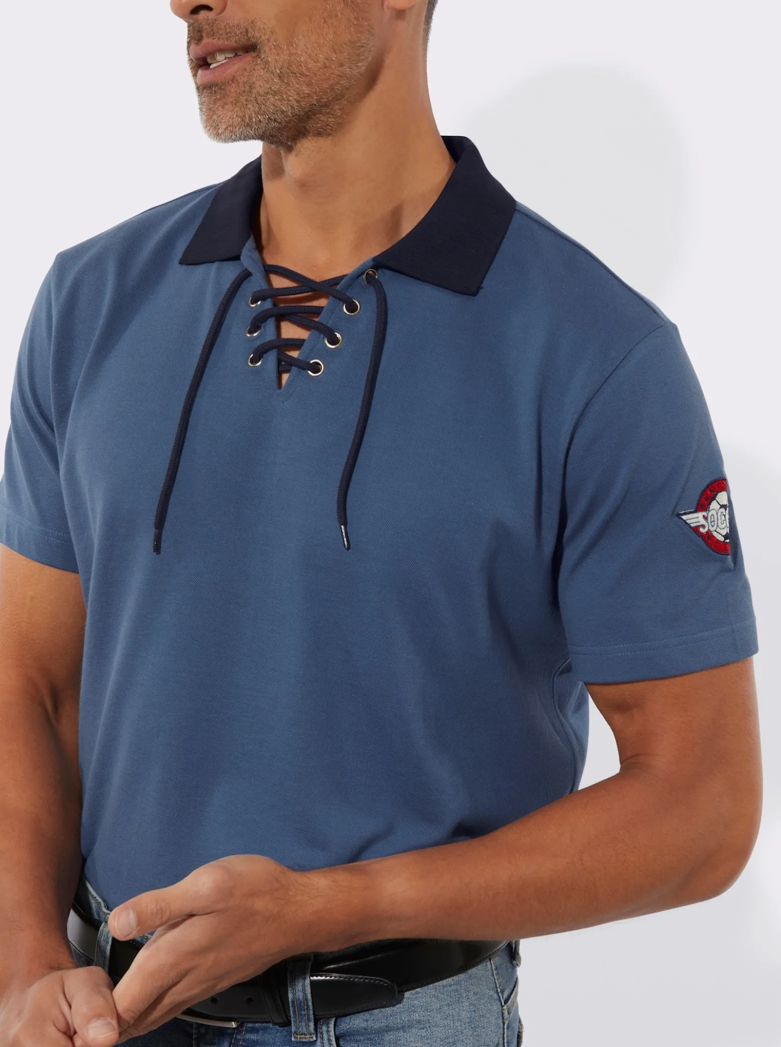 Poloshirt mit Schnürung am Ausschnitt