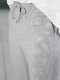 Schlupfhose mit silberfarbenen Galonstreifen