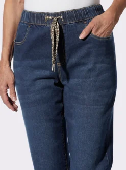 Schlupfjeans mit Bindeband im Leo-Dessin