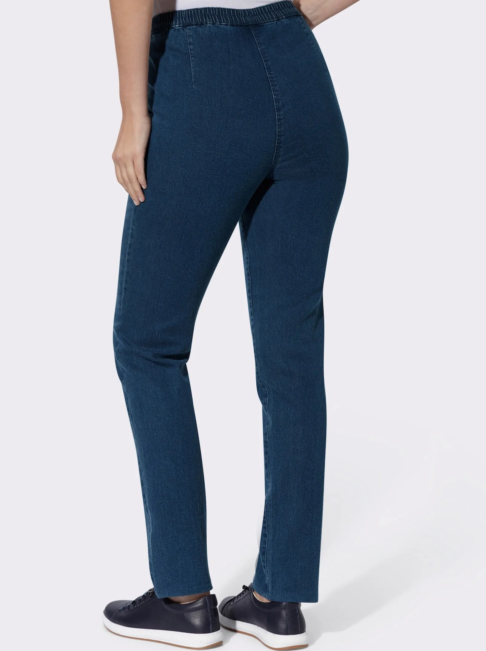 Schlupfjeans mit schrägen Taschen