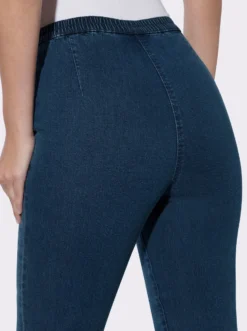 Schlupfjeans mit schrägen Taschen