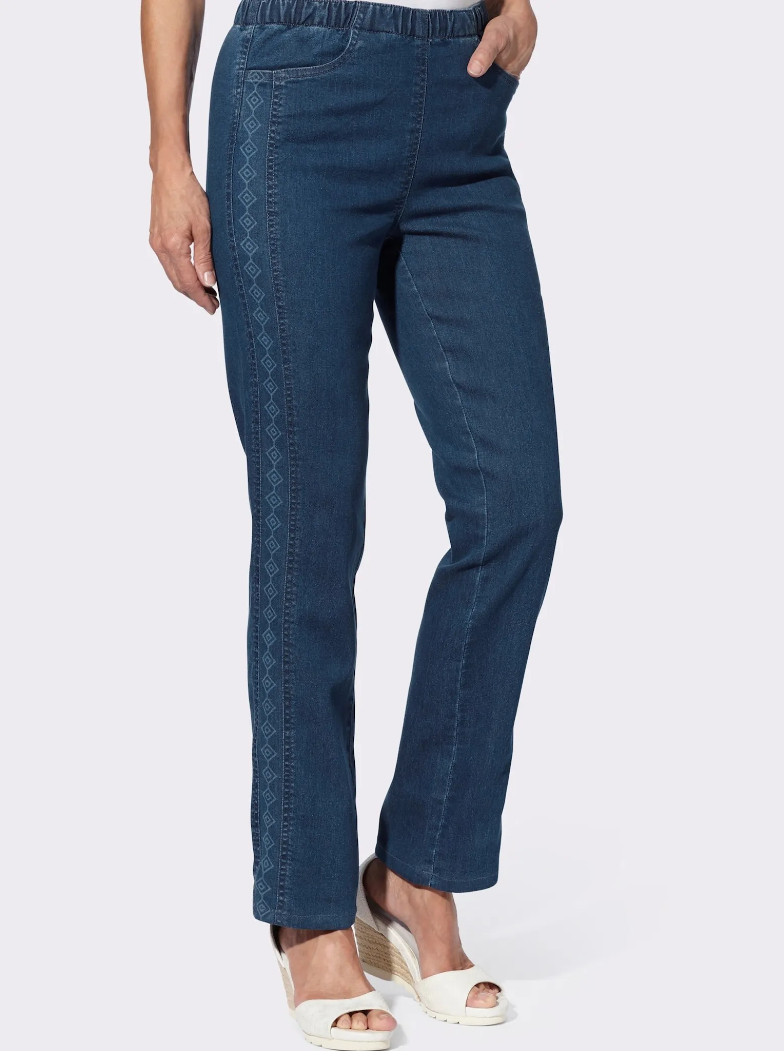 Schlupfjeans mit seitlichem Druck