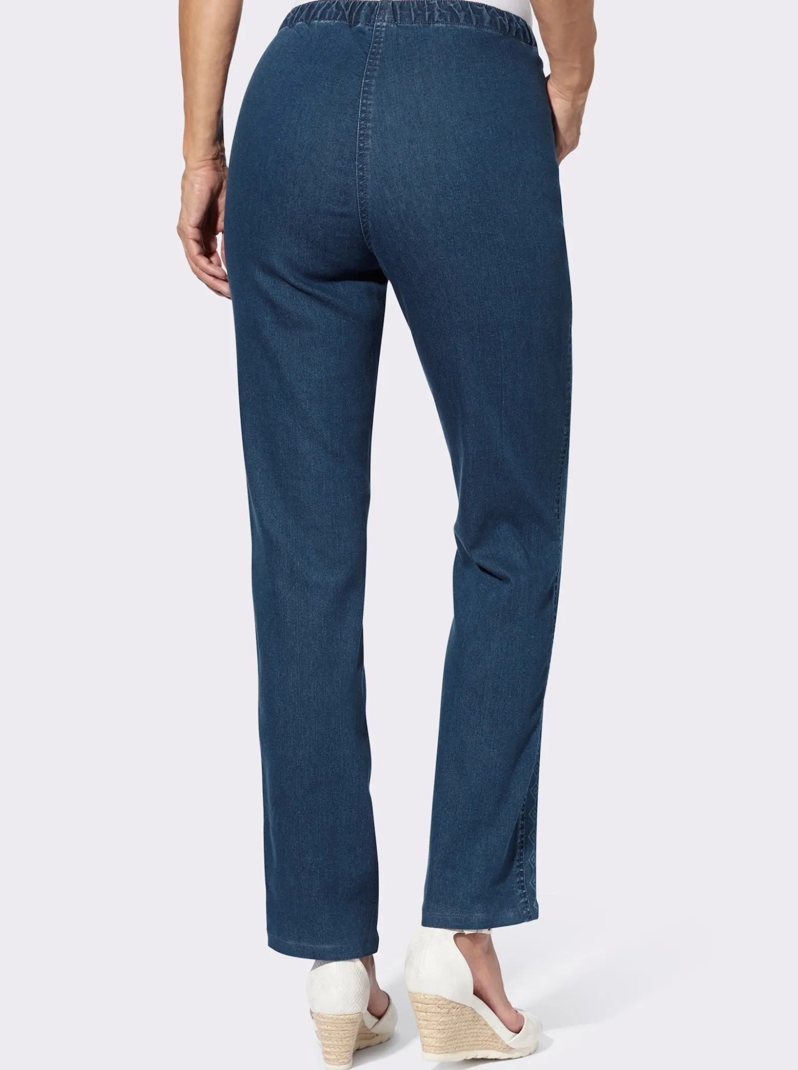 Schlupfjeans mit seitlichem Druck