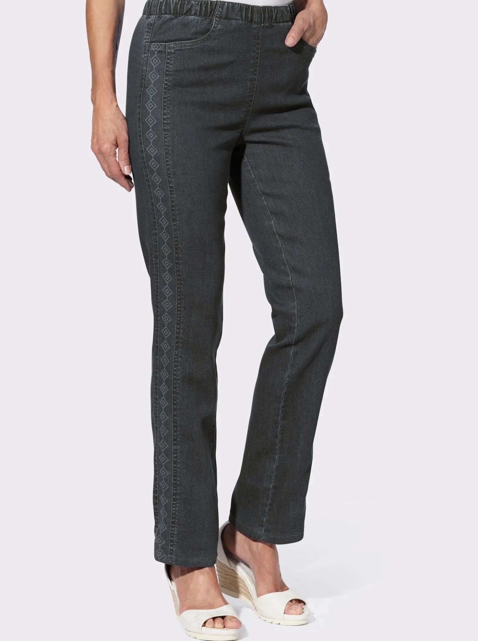 Schlupfjeans mit seitlichem Druck