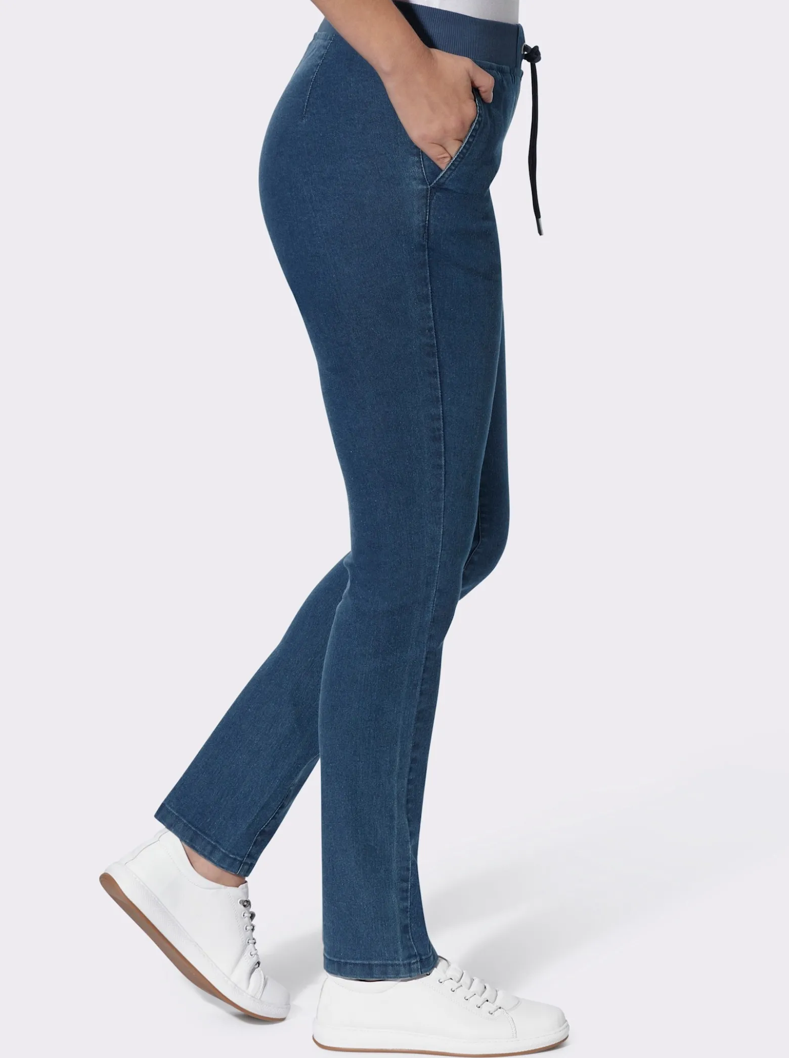 Schlupfjeans mit Ösen und Zierband