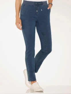 Schlupfjeans mit Ösen und Zierband