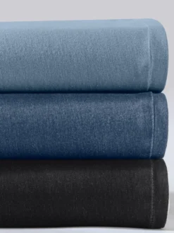 Schlupfjeans mit Ösen und Zierband