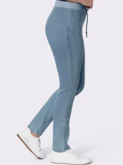 Schlupfjeans mit Ösen und Zierband