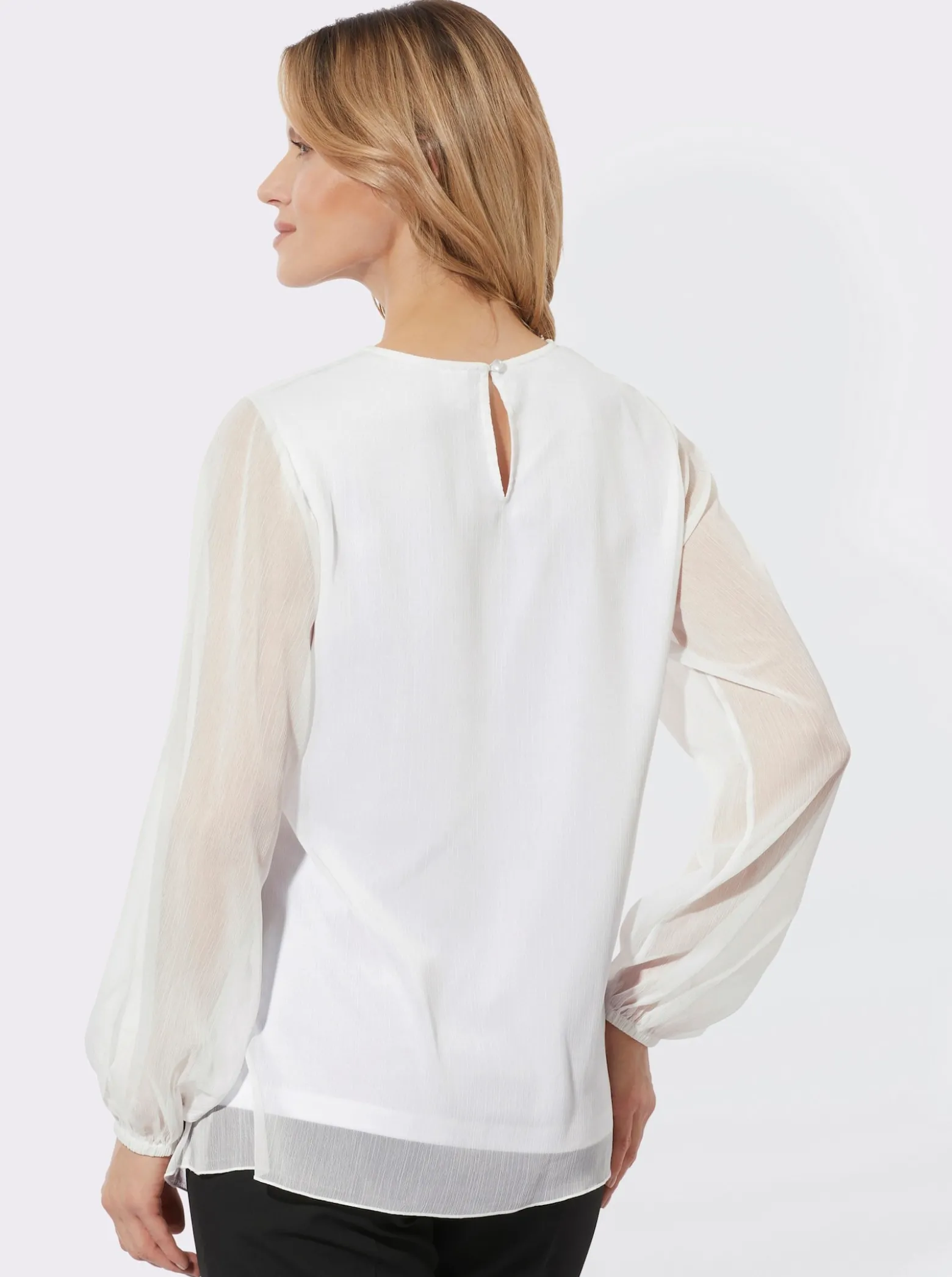 Spitzenbluse mit transparenten Ärmeln