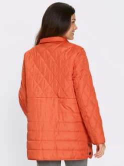 Steppjacke Seitenschlitze mit Druckknöpfen