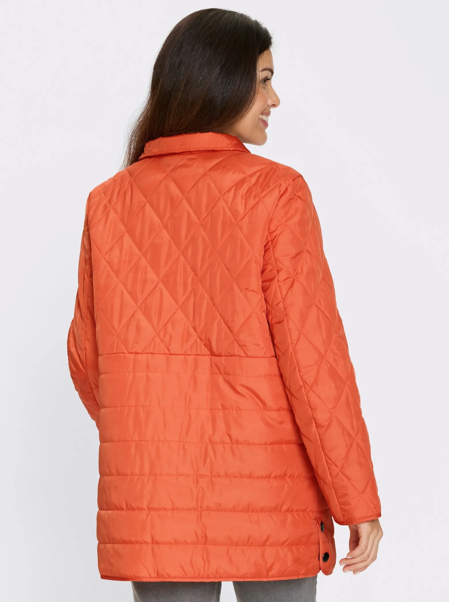 Steppjacke Seitenschlitze mit Druckknöpfen
