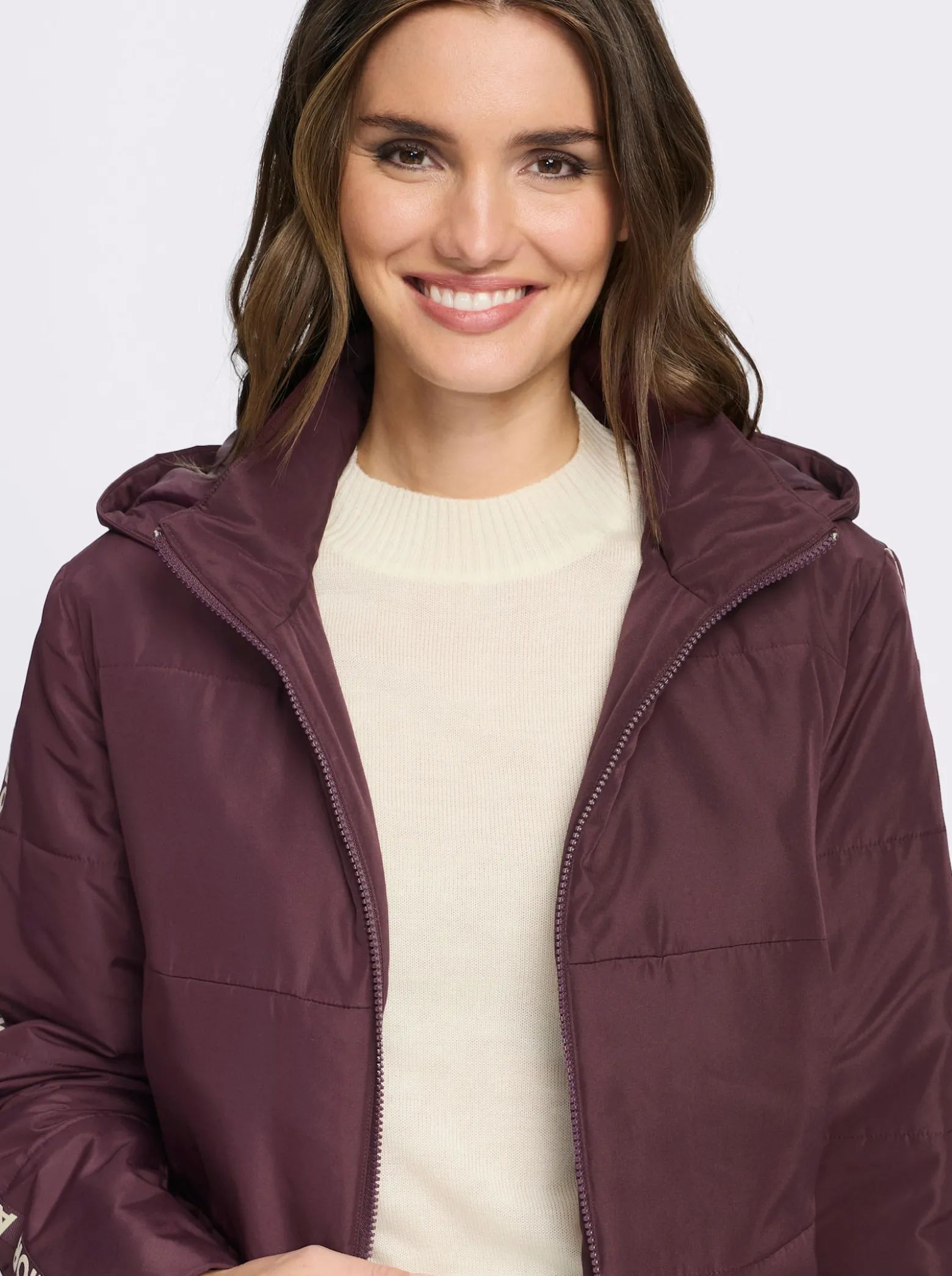 Steppjacke Zierband mit Schriftzug