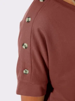 Sweatshirt mit Zierknöpfen an der Schulterpartie